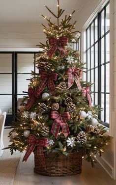 a decorated christmas tree in a basket