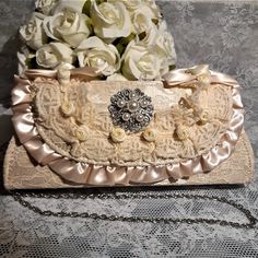 Your special day means every detail has to be as perfect as possible, so trust the White Swan Design Lace Clutch to tote your wedding essentials! This gorgeous clutch has a new design and a reliable decorated closure.The faux pearls and Austrian crystals create an allover classic design. Undo the closure to reveal a lined interior and a detachable strap. Colour: champagne Size: size: 25cm*11cm*5cm(L*H*W) -------------------- International Shoppers: Please send me a message with your location for details about shipping costs as there are faster deliveries available. Add our shop to your Favorites to get the unique coupon codes and discounts! Elegant Cream Shoulder Bag For Gift, Elegant Cream Shoulder Bag As Gift, Elegant Cream Shoulder Bag As A Gift, Elegant Cream Bag Gift, Elegant Cream Bag For Gifts, Cream Handheld Clutch For Formal Occasions, Formal Cream Handheld Clutch, Beige Rectangular Bags For Wedding, Beige Rectangular Shoulder Bag For Wedding