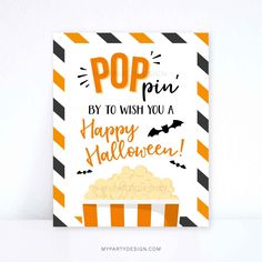 an orange and black striped card with the words pop by to wish you a happy halloween