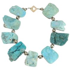 Dynamic High Quality Hand Carved and Polished Natural Rock Turquoise Quartz Druzy Necklace inter-spaced with Sterling Silver Beads; infusing your outfit with grand style and textured detail. Boasts raw texture and bold statement style in this gorgeous turquoise Necklace. Approx. length: 19” Unique and Fabulous as You are! Necklaces Blue, Necklaces Beaded, Amazonite Jewelry, Blue Choker, Sterling Silver Choker, Diy Jewelry Necklace, Artisan Bracelets, Druzy Necklace, Druzy Quartz