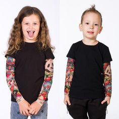 Are you searching for a cool and unique clothing for your baby? Or maybe you are searching for a great gift for some ink lover's little one? Invite them to the world of tattoos and bring some edgy style to their everyday wardrobe with our unique tattoo clothing collection for kids.T-SHIRT is made of high-quality and very durable cotton and is really nice fitting! SLEEVES are made of pleasantly smooth mesh material which is delicate in touch but also very solid and durable in use. It's also highl Family Matching Black Tops With Character Print, Black Family Matching Tops With Character Print, Black Long Sleeve T-shirt For Family Matching, Family Matching Long Sleeve Tops With Cartoon Print, Fun Black Long Sleeve Shirt, Black Long Sleeve Shirt With Character Print, Family Matching Long Sleeve Tops With Character Print, Playful Unisex Tops With Character Print, Playful Character Print Tops