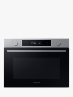 a black and silver oven on a white background