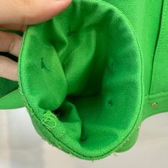 St. John Sport by Marie Gray Green Jacket. Has light shoulder pads. Gold details throughout including logo buttons. Bright green colored lightweight jacket. Collared jacket with button down front. Rivets on the collar and bottom hem. This item have been hemmed at the cuff, however the hem can be let out and returned back to its original cuff length, as shown in photos. Made in the USA Women's size Small Petite Measurements with the garment laying flat: Pit to pit: about 19 inches Length: about 2 Collared Jacket, Gray Green, Green Jacket, Kelly Green, Lightweight Jacket, Bright Green, Gold Details, Rivets, St John