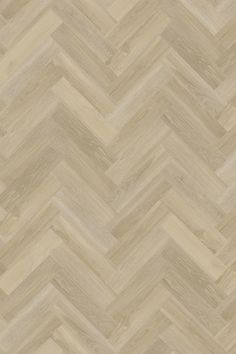 an image of wood flooring that looks like chevroned herringbones in beige