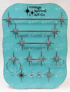 a display case with several different types of piercings on the front and back of it