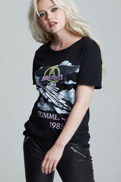 An iconic tee for one iconic band; this is a must-have item for any fan of the classic rock band Aerosmith. This classic oversized band tee features Aerosmith’s 1985 summer tour and is designed with authentic tour graphics on the front, and tour dates on the back. Made with soft cotton fabric, distressed edges, a wide crew neckline, a raw cut bottom hem, and a loose boyfriend tee fit. Details Style #301730B Color: Black Aerosmith Summer Tour 1985 Boyfriend T-Shirt 100% Cotton Care/Import Machine Washed Black T-shirt For Summer Streetwear, Edgy Washed Black T-shirt For Spring, Summer Graphic Print Washed Black T-shirt, Summer Washed Black Graphic Top, Summer Distressed Band Merch T-shirt, Edgy Graphic Tops For Summer, Edgy Summer Tops With Graphic Design, Edgy Graphic Design Tops For Summer, Casual Summer T-shirt For Concerts