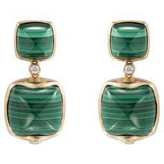 Sweet Sugarloaves! Light and easy to wear these earrings showcase beautiful sugarloaf gemstones accented with a gold frame and diamonds. These earrings are dainty yet have a great pop of color from the vibrant gems. Malachite Sugarloaf Earrings with Diamond in 18 Karat Yellow Gold Malachite: 8.27 carats, 8x8mm size, cushion sugarloaf cabochon, 2 pieces. Malachite: 25.92 carats, 12x12mm size, cushion sugarloaf cabochon, 2 pieces. Diamond: 0.121 carats, round shape, TTLB quality. Gold: 8.86g, 18K Naha, Stunning Earrings, 3 Carat, Emerald Diamond, Gold Frame, Round Shape, Jewelry Earrings Dangle, Gold Earrings, Diamond Earrings