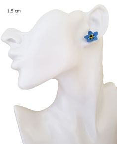 This listing is for one pair of my completely hand sculpted blue Forget Me Not stud earrings. Available for pierced and non-pierced ears. Choose titanium (hypoallergenic), 925 sterling silver or 14k gold filled posts or choose metal clip ons. -Original hand sculpted polymer clay flowers -Durable, water-resistant -No molds, no paint -No glue, studs embedded within flower -Studs/Earnuts in titanium (hypoallergenic), 925 sterling silver and 14 gold filled -Clip ons (non-pierced ears) available -Flo Blue 3d Flowers Earrings, Blue Flower Earrings With 3d Flowers, Blue Handmade Flower-shaped Earrings, Blue Flower-shaped Earrings For Gifts, Blue 3d Flower Earrings For Gift, Blue 3d Flower Earrings As Gift, Blue Handmade Flower Jewelry For Gifts, Handmade Flower Blue Jewelry As Gift, Handmade Blue Flower Jewelry For Gifts