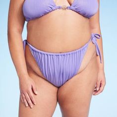 Lurex plisse bikini bottom from Wild Fable™ in purple. Made from soft fabric with four-way stretch and full lining for flexible comfort in and out of the water. Tailored with extra-cheeky coverage and a low-rise, high-leg silhouette with elastic at leg openings. Side string ties with floral charms complete the look with a customizable fit and elevated visual appeal. If you’re not satisfied with any Target Owned Brand item, return it within one year with a receipt for an exchange or a refund. Wil High Leg, Womens Clothing Sizes, Body Measurements, Soft Fabrics, Purple, Clothes For Women, Women Shopping, Clothes