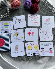 playing cards on a tray with flowers and beads