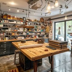 a room filled with lots of shelves and tables