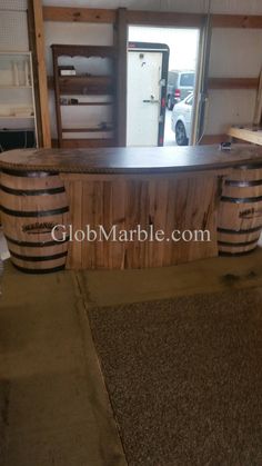 the inside of a storage room with two wooden barrels