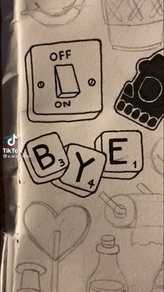 an open book with drawings on it and the words bye written in black ink next to each other