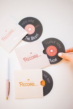 someone is holding three records with the words you are the best and i am record