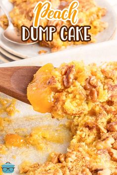 peach dump cake on a plate with a wooden spoon