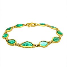 This 22K Gold Wrapped Free Form Emerald and Diamond Bracelet is handcrafted and one of a kind. 22 Karat Gold Wrapped Free-Form Emeralds and Diamonds Bracelet 22K – 7.5″ inches 33 G/VS 0.2 CTW 10 Colombian Emeralds 30 CTW Handmade Push Clasp David Tishbi Offers: - Limited Lifetime Guarantee - Complimentary Gift Box Diamonds Bracelet, Gold Wrap, Colombian Emeralds, Art Deco Era, Emerald Diamond, 22k Gold, Link Bracelets, Arm Band, Cookie Recipes