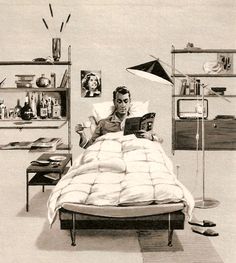 a woman laying in bed reading a book