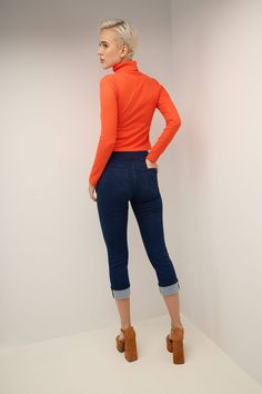 An everyday favorite, this skinny fit Capri jean offers the perfect blend of comfort and practicality thanks to its wide smoothing contour waistband that has a hidden elastic for easy pull-on styling with no need for buttons or zippers. The 25” inseam has been paired with a slim and fitted leg cut that slims down the body and makes it appear virtually airbrushed. Meanwhile, the mid-rise waistband lies just beneath the navel for all-day comfort. Metal rivets and a “R” logo to the back pockets. Th Slim Fit Mid-rise Jeggings For Fall, High Waist Stretch Cropped Jeans For Spring, Stretch Dark Wash Cropped Jeans, Stretch Cropped Leg Jeans In Dark Wash, Stretch Cropped Jeans In Dark Wash, Stretch Jeans For Workwear In Winter, Trendy Stretch Mid-rise Cropped Jeans, Stretch Jeans For Winter Workwear, Winter Stretch Jeans For Workwear