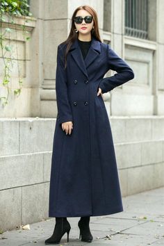 This woman long wool coat in navy blue is a timeless winter piece that will add a divine pop of color to your winter wardrobe.  This coat is a stunning color, lovely length, and keeps me warm.  Endlessly versatile, layer it over jeans and sweaters or sleek dresses for countless styling options.  FEATURES 50% wool, 50% fiber,nylon Polyester lining Double-breasted button closure Long sleeve coat Two side pockets Ankle length Perfect for winter, autumn Dry clean ★★ The model's height approx 170 cm (5′ 7″) with the 84 cm (33") bust, 66 cm (26") waist. She is wearing the wool coat in size XS (US2) ★★Bespoke Order Service Request other color Request the Length Request the sleeve length Your height is not between 155cm- 175cm Your weight is not between 47kg -77kg  ★★ Get your size in Size Chart w Winter Office Peacoat With Buttons, Navy Outerwear For Office In Winter, Double-breasted Winter Office Peacoat, Double-breasted Peacoat For Office In Winter, Navy Long Pea Coat For Winter, Navy Long Peacoat For Winter, Long Pea Coat For Office, Office Long Coat Peacoat For Fall, Navy Wool Coat For Winter Workwear