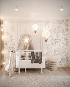 a baby's room with a white crib, lamp and wallpapered walls