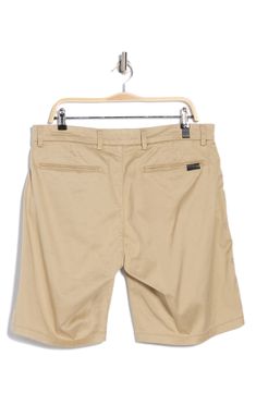 Go casual in solid chino shorts constructed from soft, stretchy twill for all-day comfort. 9" inseam; 11 1/2" front rise (size 33) Zip fly with button closure Front slant pockets; coin pocket; back welt pockets 61% lyocell, 35% cotton, 4% elastane Machine wash, line dry Imported Summer Casual Chino Cotton Twill Bottoms, Casual Cotton Bermuda Shorts For Work, Casual Bermuda Shorts For Business In Summer, Casual Bermuda Shorts For Spring Workwear, Casual Summer Bermuda Shorts For Business, Summer Business Casual Bermuda Shorts, Cotton Bermuda Shorts For Business Casual, Fitted Cotton Bermuda Shorts For Business Casual, Spring Cotton Bermuda Shorts For Business Casual