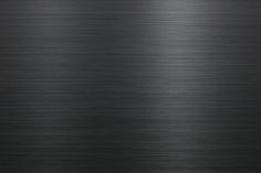 a black metal texture background that looks like it has been brushed