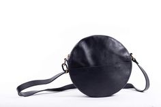 Zuri Circle Bag - Black – UnoEth Leather Circle Bag, Life Essentials, Circle Purse, Circle Bag, Handbag Collection, Leather Conditioner, Black Crossbody, Circle Shape, Leather Care