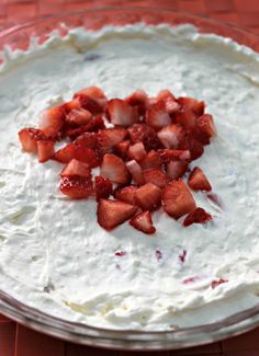 low carb strawberry cheesecake mousse with strawberries on top