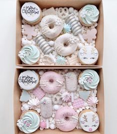 two boxes filled with different types of donuts and cupcakes on top of each other