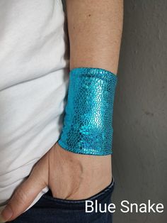 Long fabric wrist cuff bracelet in blue snake with a texture of tiny diamonds - CHOOSE YOUR COLOR from the drop down menu. Visit my shop for more colors. https://www.etsy.com/shop/VinciBazaar Handbands, wrist cuffs, wrist wraps - visit my shop for more color matching accessories *Handmade with love and care in a smoke free home *Every wrist cuff is sewn by me *Double layered *Ideal for covering wrist tattoos *Stretchy and soft polyester  *Fabulous accessory for your outfit *Goes well with everyt Cheap Handmade Blue Cuff Bracelet, Blue Cuff Bracelets For Festivals, Blue Bracelet Wristband For Festivals, Cheap Bohemian Blue Wristband, Unique Blue Cuff Bracelet For Festival, Blue Wristband For Festivals, Sparkle Fabric, Party Wristbands, Wrist Tattoo Cover Up