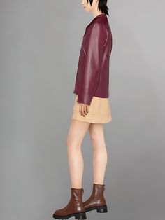 Step into sophistication with the Women's Maroon Leather Cropped Baby Jacket, a chic and timeless piece that seamlessly combines the richness of maroon with the allure of a cropped silhouette. This jacket isn't just outerwear; it's a bold fashion statement that exudes elegance and modern style. Crafted with precision from high-quality leather, the Maroon Leather Cropped Baby Jacket promises not only a sleek and stylish exterior but also durability, creating a garment that stands as a symbol of e Spring Leather Jacket With Concealed Placket, Classic Brown Cropped Long Sleeve Jacket, Classic Brown Long Sleeve Cropped Jacket, Classic Long Sleeve Brown Cropped Jacket, Tailored Leather Jacket With Long Sleeves For Fall, Tailored Long Sleeve Leather Jacket For Fall, Elegant Brown Long Sleeve Cropped Jacket, Elegant Long Sleeve Brown Cropped Jacket, Elegant Long Sleeve Cropped Jacket For Fall