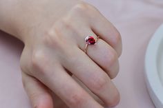 14k Rose Gold Garnet Engagement Ring, Teardrop Cut Garnet Ring, January Birthstone Ring,  Anniversary Ring, Gift For Her, Mothers Day Gift Item Gemstone: AAA Grade Garnet Cubic Zirconia Size: 8*6 Color: Red Shape: Pear Average Quality: AAA+ 🎉All of gold options of the product are produced from solid gold. 🎉While using the product, it's healthier to avoid touching the cream and similar products in terms of cleaning the product. 🎉Items are shown larger in pictures to show details-please note the dimensions. Package 🎀 All of these products are sent carefully packed in elegant jewelry boxes. 🎁 How to order 🤳🏼 🎉First step: Click on the product. 🎉Second Step: Select the material. 🎉Third Step: Select the ring size. Production Times⌛ *These items are my shop are handmade made to order. Classic Teardrop Ruby Ring For Gift, Red Gemstone Jewelry For Proposal, Classic Pear-shaped Red Rings, Classic Red Pear-shaped Rings, Elegant Teardrop Ruby Ring As Gift, Elegant Teardrop Ruby Ring Gift, Red Oval Birthstone Ring For Proposal, Red Ruby Pear-shaped Rings, Fine Jewelry Red Teardrop Ruby Ring