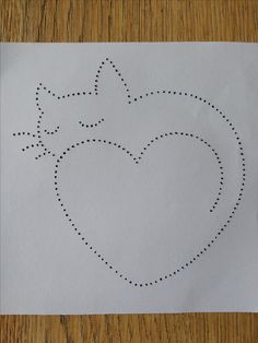 a piece of paper with a heart drawn on it