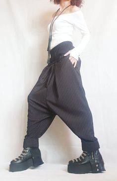 "Avant Garde Pants, Harem Pants Women ❤️ Extravagant designs and high quality fabrics! ❤️ Materials & Care Textile, Polyamide, Cotton Hand wash at low temperatures. Do not machine dry. Do not iron. Do not dry clean! ❤️ Sizing We can make your piece from XS to 5XL! Everything in the shop can be also made according to your measures free of charge! ❤️ Shipping ✈ Ready to ship The time I need to prepare an order for shipping varies. For details, see individual items. Priority shipping is used fo Avant-garde Baggy Wide Leg Bottoms, Avant-garde Baggy Wide Leg Pants, Elegant Baggy Harem Trousers, Wide-leg Harem Pants With Belt Loops, Elegant Baggy Wide-leg Harem Pants, Elegant Loose Fit Harem Pants, Fitted Wide Leg Harem Pants With Belt Loops, Baggy High-waisted Wide Leg Pants With Belt Loops, Avant Garde Pants