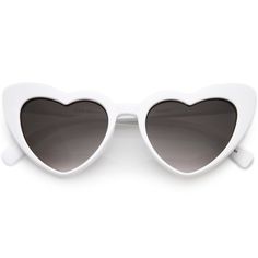 Description Measurements Shipping These oversize heart shaped sunglasses are sassy and sweet all at the same time. Combining a classic style with a fun shape has created a closet accessory must-have. From the frame to the simple curves on the nose piece, you may have a hard time picking just one of the neutral colored lens options. Finished with a plastic based frame, reinforced metal hinges, and 100% UV protected lenses. Lens Width: 51mm Nose Bridge: 22mm Lens Height: 41mm Total Width: 149mm Fr Chic Heart-shaped Sunglasses For Summer, Heart-shaped Sunglasses With Heart Print, White Heart-shaped Sunglasses With Gradient Lenses, Trendy Heart-shaped Sunglasses With Heart Print, White Heart-shaped Sunglasses For Valentine's Day, White Heart-shaped Sunglasses For Summer, White Heart-shaped Sunglasses With Tinted Lenses, Heart-shaped White Sunglasses With Tinted Lenses, White Heart-shaped Sunglasses For Beach