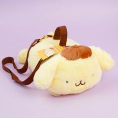 Go on adventures together with this super kawaii Pompompurin plushie bag! You can take this bag with you in two different ways. One as a shoulder bag and the other as a handbag! Made from soft, fluffy material Features two different straps Pom Pom Purin Headband, Pom Pom Purin Hello Kitty, Pompompurin Backpack, Pompompurin Merch, Kawaii Pompompurin, Aesthetics Accessories, Cute Bed Sheets, Sanrio Things