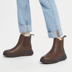 An elevated take on an icon. We've brought a closet staple bang up to date – setting a classic Chelsea boot upper on a superchunky (yet lightweight) sole. Clean. Contemporary. Crafted in smooth high-quality leather, with minimal seaming, and simple lines that complement almost any outfit. Thick stretch panels on both sides and pull tabs ensure easy on/off. Featuring a new flatform-version of our Microwobbleboard™ midsole to deliver unbeatable comfort, non-stop cushioning (and a little extra height). Cool Britannia with a modern edge. Fitting note: Please be aware that these boots have an 'average to slim' width fit, so may feel narrower than other styles on our Microwobbleboard midsole. Ankle-high Chelsea Boots For Streetwear In Fall, Ankle-high Chelsea Boots For Fall Streetwear, Brown Mid-top Boots With Contrast Sole, Everyday Fall Boots With Reinforced Heel, Trendy Mid-top Boots For Fall, Ankle-high Waterproof Boots With Rubber Sole For Fall, Everyday Ankle Boots For Winter, Trendy Mid-top Leather Boots, Everyday Winter Ankle Boots