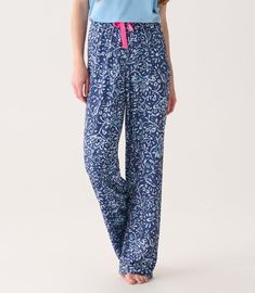 Drift off to dreamland in our Women's Batik Flowers Pajama Pants, crafted from a soft polyester and spandex blend. The batik-inspired floral print adds a touch of bohemian charm to your nighttime routine. Cotton Floral Print Bottoms For Pajama Party, Floral Print Cotton Bottoms For Pajama Party, Blue Sleepwear With Elastic Waistband And Wide Leg, Blue Wide Leg Sleepwear With Elastic Waistband, Floral Print Relaxed Fit Bottoms For Pajama Party, Blue Paisley Print Casual Bottoms, Floral Print Full-length Loungewear Pants, Blue Bohemian Sleepwear With Floral Print, Floral Print Long Pants For Pajama Party