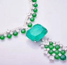 Introducing the epitome of luxury and elegance - the Luxury Fusion Emerald Necklace! For all you Colombian Emerald enthusiasts out there, this exquisite piece is a dream come true. Crafted to exude the opulence and allure of real Colombian emerald, this necklace is a true masterpiece.Featuring part green Cabochon buttons and Zirconite Cubic Zirconia, this stunning necklace is designed to captivate and mesmerize. With its radiant beauty, it's guaranteed to turn heads wherever you go, be it at lux Luxury Emerald Necklace With Jewels For Formal Occasions, Luxury Emerald Necklace With Jewels For Formal Events, Luxury Emerald Gemstone Necklace For Formal Occasions, Luxury Emerald Necklace For Formal Events, Exquisite Emerald Necklace, Exquisite Emerald Diamond Necklace, Exquisite Emerald Necklace For Formal Occasions, Exquisite Green Necklace With Brilliant Cut, Exquisite Green Emerald Necklace With Brilliant Cut