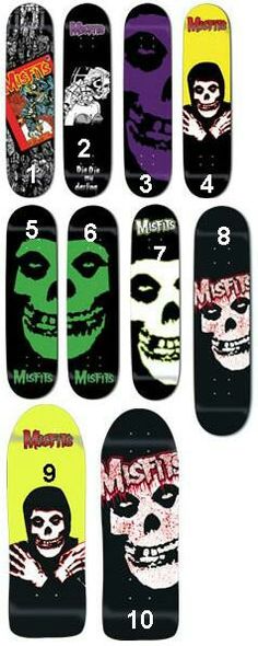 the skateboards are all different colors and have faces painted on them, as well as numbers