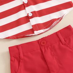 Dress your baby boy in our 4th of July Flag Outfit for a stylish celebration! Featuring a star striped design and red shorts, it's perfect for parades and cookouts. Keep your little one cool and proud of their American pride. Red Shorts For Summer Playtime, Playful Red Cotton Shorts, Corduroy Skirt Outfit, Hoody Outfits, Flamingo Outfit, Outfits Pastel, Beanie Outfit, Gentleman Outfit, Flag Outfit