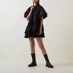 Mini smock shirt dress Classic collar Short puff sleeves Tiered frill stepped hem with raw edges Centre front twin button closure Gathered throughout Lined