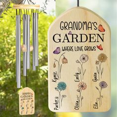 a wooden wind chime hanging from a tree with the words grandma's garden on it