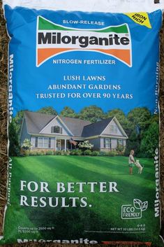 a bag of lawn fertint sitting on the ground