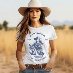 Our A Cowgirl for life t-shirt, is the perfect blend of style and western charm! Whether you're out on the ranch, riding your favorite horse, or simply rocking a casual yet chic look, this t-shirt is a must-have addition to your wardrobe. Do your t-shirts fail to keep up with your active, on-the-go lifestyle? Are you constantly tugging at your shirt or dealing with it shrinking in the wash can be a real drag, especially when you're out exploring or busy with errands. Our Bella & Canvas Unisex t- Casual White T-shirt For Western-themed Events, Casual Short Sleeve Shirt For Ranch, Fitted Crew Neck T-shirt For Rodeo, Graphic Tee Tops For Ranch, White Short Sleeve Tops For Country Events, Country Style Short Sleeve T-shirt For Ranch, Relaxed Fit Western T-shirt For Ranch, Western Style Relaxed Fit T-shirt For Ranch, Fitted Graphic Print T-shirt For Ranch