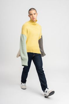 DESCRIPTION Effortless oversized sweater Multi colored sweater Four naturally dyed colors: yellow front, white back, sage sleeve, and purple sleeve Super soft Alpaca wool Extra soft, fluffy sweater Extended sleeves Turtleneck sweater Unisex sweater Made in Peru following ethical practices 100% super soft baby-alpaca wool MIX-AND-BUNDLE Laid-back luxury: pair it with The Shorts for an effortless luxury silhouette. COLORSDark Grey / White / Light Grey / Pink / Blue / Multi color yellow COMPOSITION Yellow Color Block Sweater For Winter, Yellow Long Sleeve Sweater For Layering Outfits, Yellow Winter Sweater For Layering, Yellow Relaxed Fit Winter Sweater, Oversized Long Sleeve Yellow Sweater, Yellow Oversized Cozy Sweater, Oversized Cozy Yellow Sweater, Oversized Yellow Cozy Sweater, Cozy Yellow Sweater For Layering