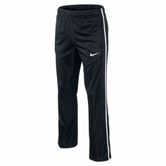 the nike pant is black and white, with stripes on the side of it