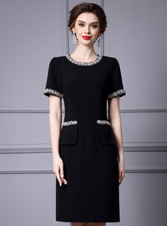 Meet sophistication and style with this exquisite mother of the bride dress, perfect for making a lasting impression. The timeless black color symbolizes elegance and celebration, making it an excellent choice for a significant occasion. The dress features delicate beaded embellishments on the neckline, sleeves, and pockets, adding a touch of glamour and femininity. The tailored silhouette creates a flattering fit for all body types, enhancing your natural curves. Crafted from premium materials, Fluid Movement, Girl Material, Beaded Embellishments, Princess Tiara, Queen Crown, Rhinestone Hair, Black Short Dress, Mother Of The Bride Dress, Guest Dress