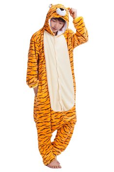 a man in a tiger costume is standing with his hands on his head and wearing sunglasses