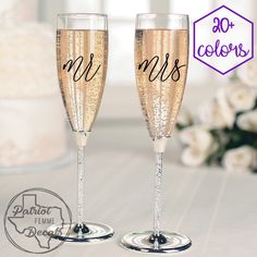 two champagne flutes with the words mr and mrs written on them